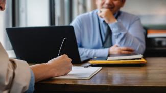 Student submitting a student grant application