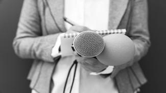 A qualified journalist who received funding through bursaries. 