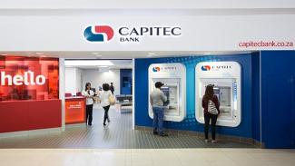 People entering a Capitec branch to apply for loans