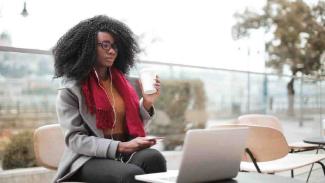Student checking where to apply for a student loan 