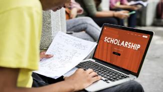 Student looking over a scholarship application